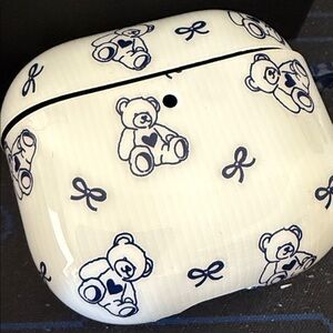 Velvet Caviar Cream and Black Bear AirPods Case